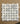 Statuary Calacatta Basket Weave with Black Dots